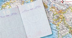 Open passport on top of a map