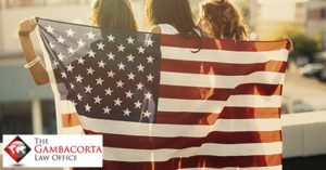 Girls holding an American flag 
